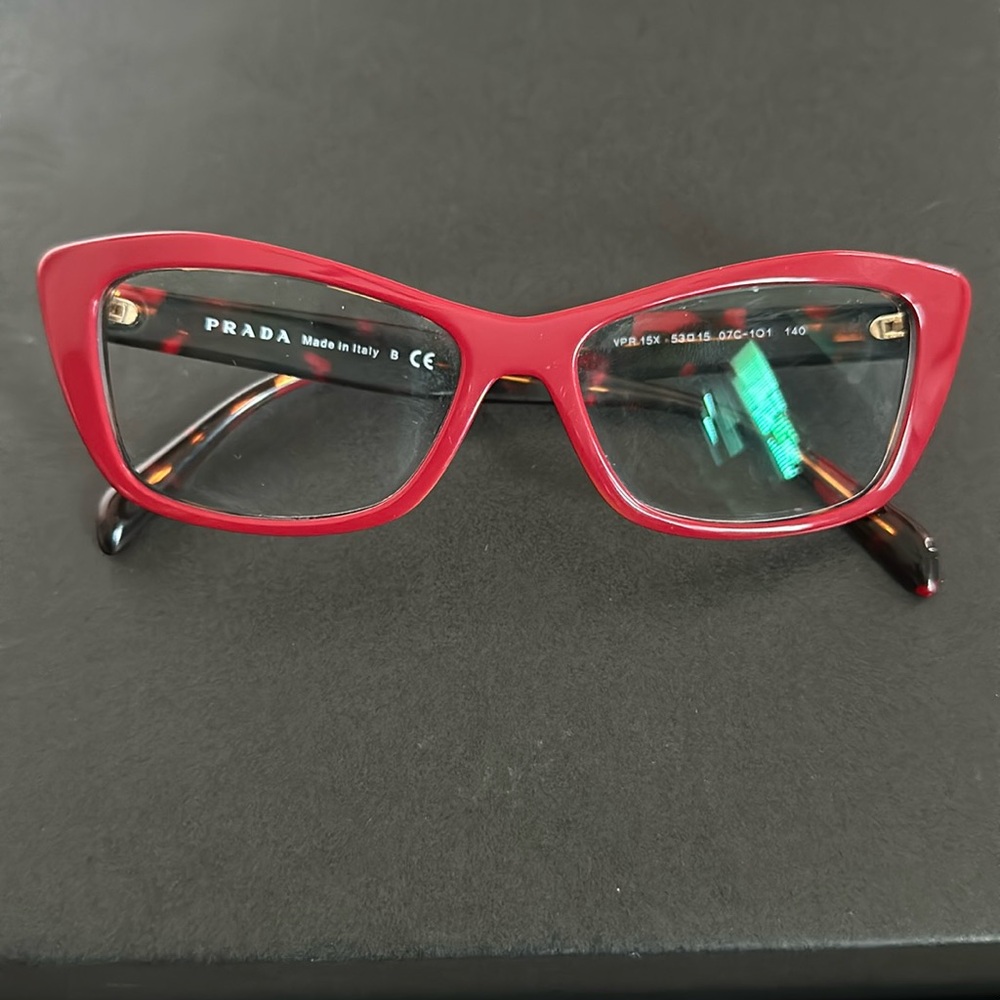 Prada frames with prescription and case.
